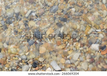 pebbles on the beach when water flood