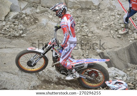 LOZOYUELA, SPAIN - APRIL 12th 2015: Spain trial championship. Moment when Jeroni Fajardo drives a Beta motorcycle over granite rocks, in Lozoyuela, on April 12th 2015.He finished in 2nd position(TR1)