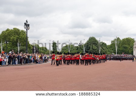 London, England - July 18, 2008 : Marching Band heads towards Buckingham Palace during Changing the Guard Ceremony in London. Changing the Guard takes place at 11.30 am daily from May to July.