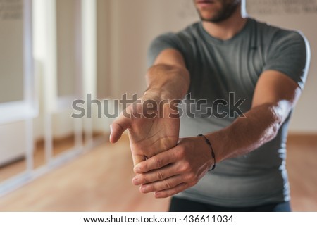 Image, Stock Photo Young man in Forearm Balance yoga pose on beach