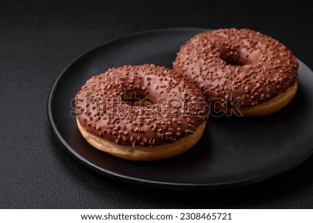 Similar – Image, Stock Photo chocolate glazed donut or doughnut with bite missing