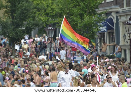 Amsterdam, Netherlands - August 2, 2014: participants in the annual event for the protection of human rights and civil equality - Gay Pride Parade on the Prinsengracht, Amsterdam