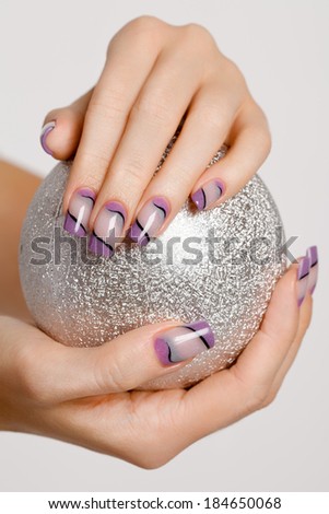 Female beautiful hands with fashionable manicure. Beauty photo