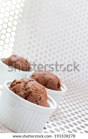 Chocolate muffins in classic ramekins