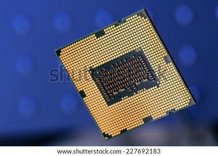Computer processor with the contact group on the blue background