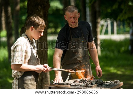 Masters is carried out in the park to them. Pushkin free training blacksmith craft. Kiev. Ukraina.23.05.2015