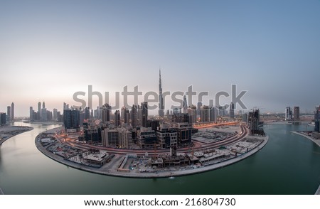 DOWNTOWN DUBAI, UAE - Feb 11: Burj Khalifa, the tallest skyscraper in the world standing at 829.8m in Dubai on Feb 11,2014. Construction began in 2004 and officially opened in 2010. Shot at Blue hour.