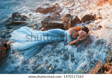 Similar – Image, Stock Photo Redhead fairytale female mermaid swimming underwater