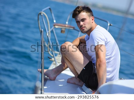 Ideal beaty brutal men on sailing yacht