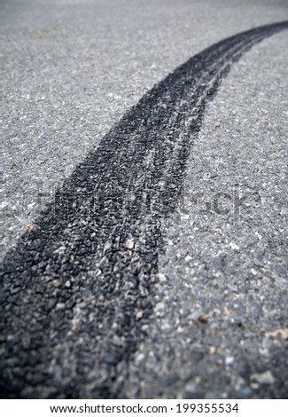 Tire tracks on the asphalt