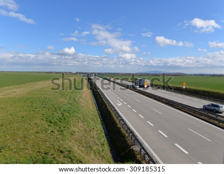 highway traffic on a lovely, sunny summer day