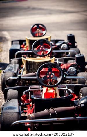 go kart cars in row outdoor track