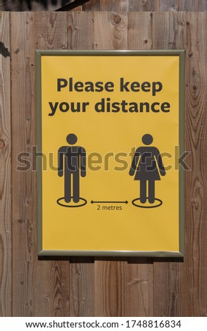 Similar – Image, Stock Photo Keep your distance, lettering stamped in red on white wall.