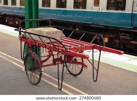 Vintage Porters Trolleys and Luggage on the Platform of Okehampton Train Station, Devon, England, UK