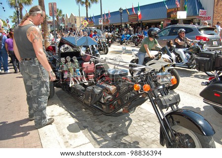 DAYTONA BEACH, FL - MARCH 17:  Customized motorcycles line Main Street during 