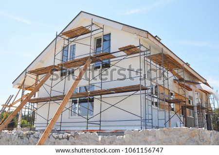 Similar – Foto Bild Fassaden und Häuserwände aus der Froschperspektive mit blauem Himmel und wenigen Wolken