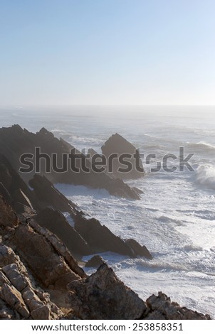 The water scape with ocean and the rocks