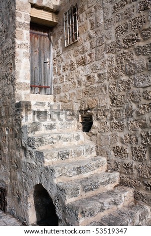 The stone ladder conducting to an input in the old house, Tel Aviv, Israel