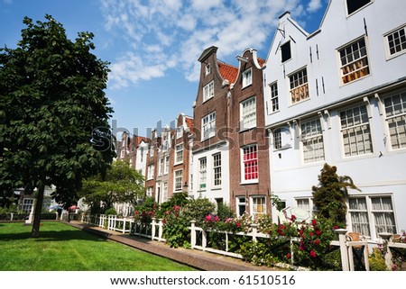 The court yard with growing roses and a chestnut, Netherlands, Amsterdam