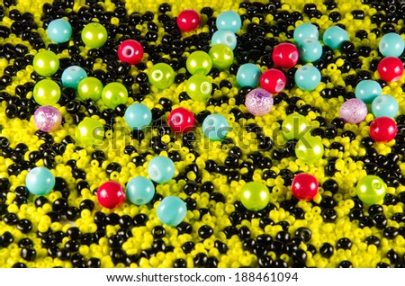 Beads - multicolored beads scattered on the surface