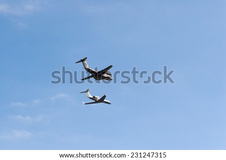 SAITAMA, JAPAN - NOVEMBER 3, 2014: Japanese Air Self-Defense Force holds their annual airshow at their Iruma airbase. They have a demonstration flight by a military cargo and a multipurpose airplane .