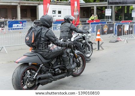 WROCLAW, POLAND - MAY 18: Harley Davidson motorcycle riders in front of the gate \
