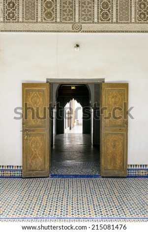 MARRAKESH, MOROCCO- AUGUST 24, 2014:  Door detail of El Bahia Palace on 24 August 2014 in Marrakesh, Morocco. The Palace is an example of Eastern Architecture from the 19th century.
