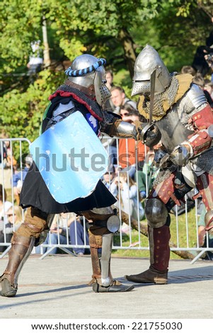 WROCLAW - OCTOBER 5: Enthusiasts of the old knights show their costumes and skills in a duel at the Cultural Center 