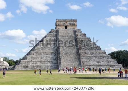 CHICHEN ITZA - JANUARY 19: Tourists visiting Chichen Itza, one of the most visited sites in Mexico on 19 January 2015 in Chichen Itza, Mexico. It is one of new 7 wonders in the world.