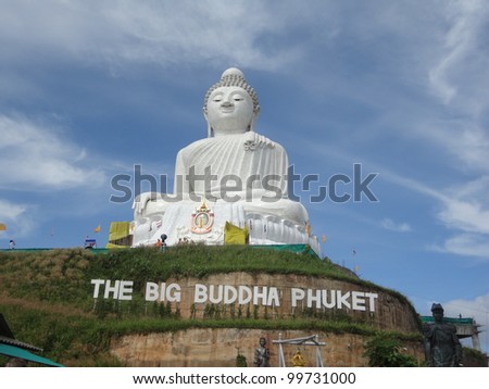 Big white marble Buddha statue on top of the hill - Phuket, Thailand