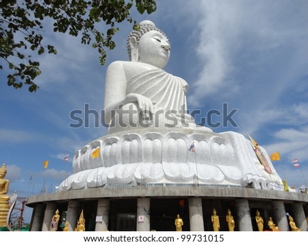 Big white marble Buddha statue on top of the hill - Phuket, Thailand