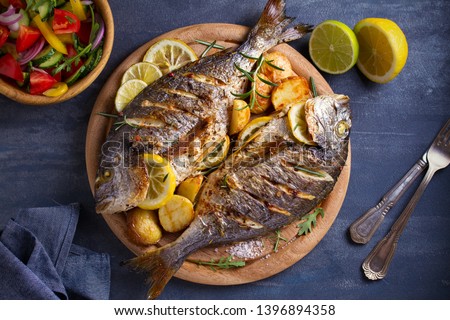 Image, Stock Photo Grilled fish and potatoes with scallion and sauce