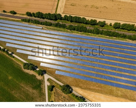 Similar – Image, Stock Photo PV open space plant , photovoltaic open space plant in front of cloudless sky, PV modules