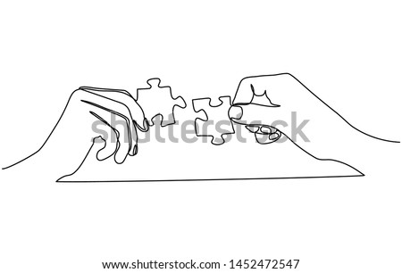 Continuous line drawing of hands solving Two Puzzle Pieces isolated on white background.