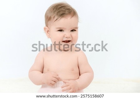 Similar – Image, Stock Photo Caucasian blonde baby seven months old lying on bed at home. Kid wearing cute clothing yellow color