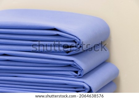 Closeup Image Of Folded Blue Drape Sheet Selective Focus ストックフォト © 