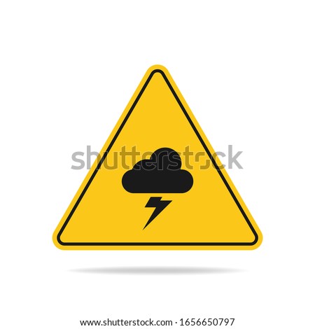 The triangular warning sign of a thunderstorm threat with lightning and cloud symbols is isolated on a white background.