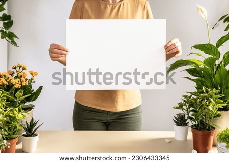 Similar – Image, Stock Photo Faceless female gardener caring about plants in garden