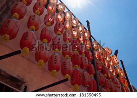 HOK TEIK CHENG SIN CHINESE TEMPLE, GEORGE TOWN, PENANG, MALAYSIA - SEPTEMBER 3, 2013: Chinese lanterns. Wording translates to phrases like healthy family, wealthy business & names of probable donors