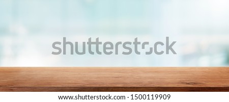 Empty wood table top and blur glass window wall building banner mock up abstract background - can used for display or montage your products. Stok fotoğraf © 