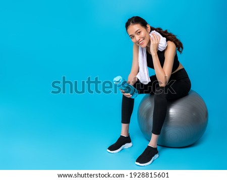 Similar – Image, Stock Photo Flexible female sitting in boat pose during yoga workout