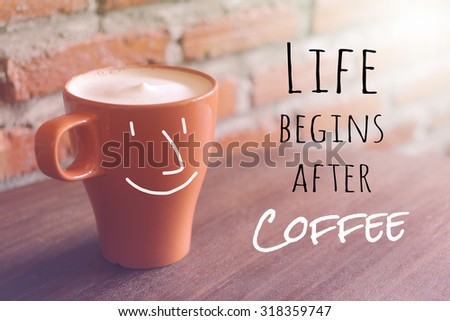 Inspirational quote on blurred coffee cup background with vintage filter