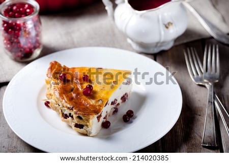 Cottage cheese pudding with cranberries and cranberry sauce, kissel. Russian traditional dish.