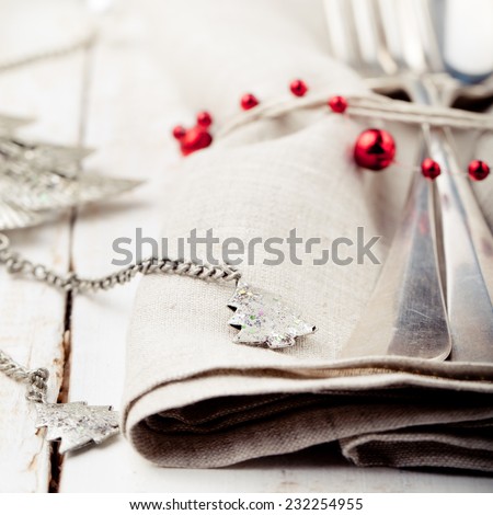 Christmas and New year table place setting with christmas decorations. Copy space.