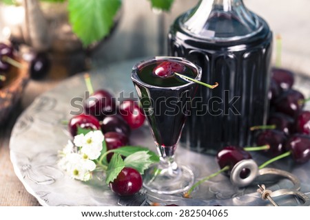 Similar – Image, Stock Photo a cherry liqueur and a beer on the pub table with tablecloth