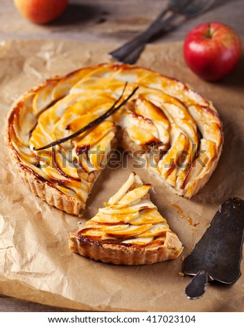 Similar – Image, Stock Photo Traditional french apple tart over brown planks