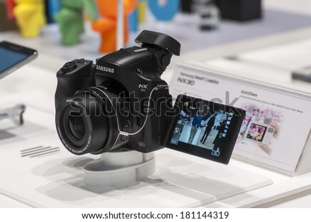 BARCELONA, SPAIN - FEBRUARY 24-27 2014: Mobile World Congress 2014. Samsung NX 30 Camera at Samsung Stand at the Mobile World Congress 2014.