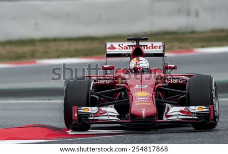 BARCELONA - FEBRUARY 21: Sebastian Vettel of Ferrari at third day of Formula One Test Days at Catalunya Circuit on February 21, 2015 in Barcelona, Spain.