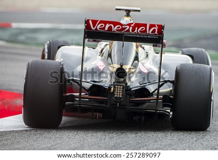 BARCELONA - FEBRUARY 26: Romain Grosjean of Lotus at first day of Formula One Test Days at Catalunya Circuit on February 26, 2015 in Barcelona, Spain.