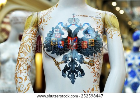 MOSCOW - FEB 14: Mannequin with different authors design at the GUM - Moscow fashion store at the Red square on February 14.2015 in Russia